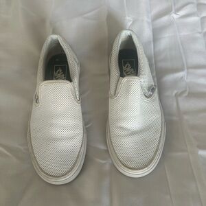 Vans Black and White Slip-On Sneakers
